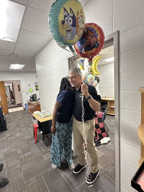 People with balloons.