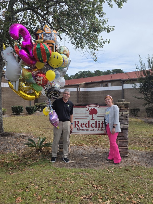 People with balloons.