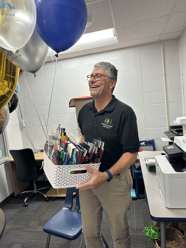 Man with basket of socks.