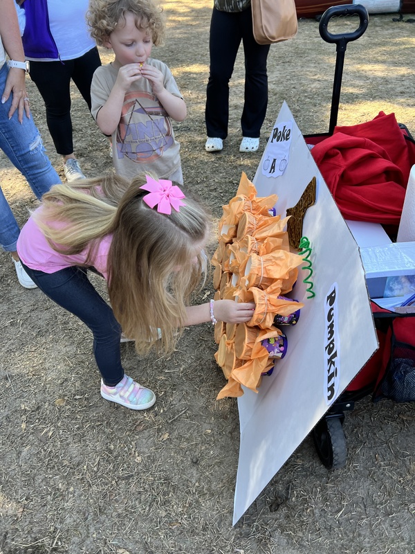 Student at Hook n Cook festival playing a game.