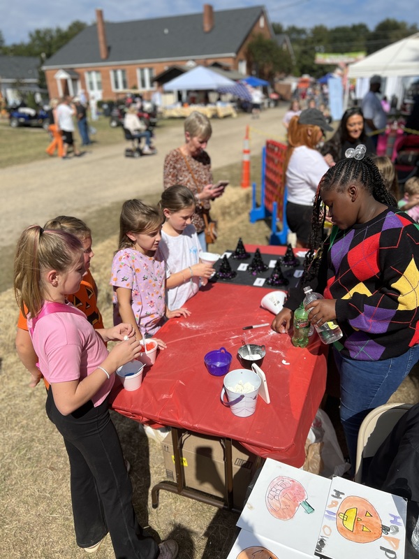 Students doing activity at Hook n Cook festival.