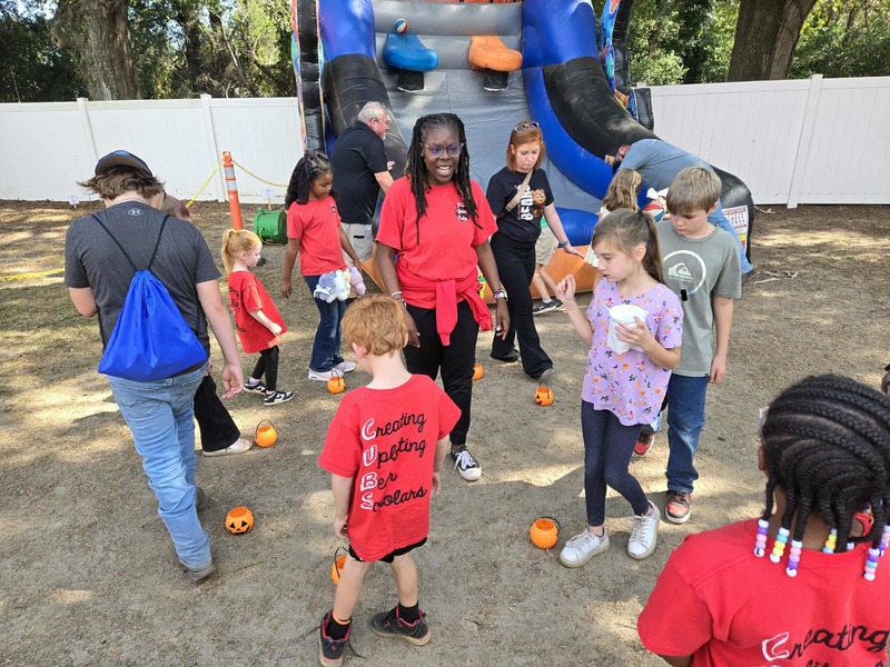 Students playing game at Hook n Cook festival.