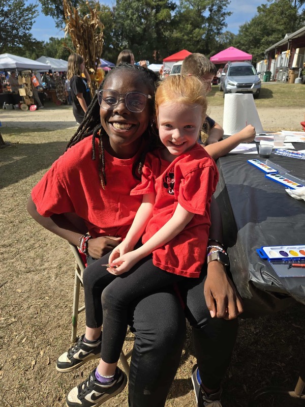 Student and staff at Hook n Cook festival.