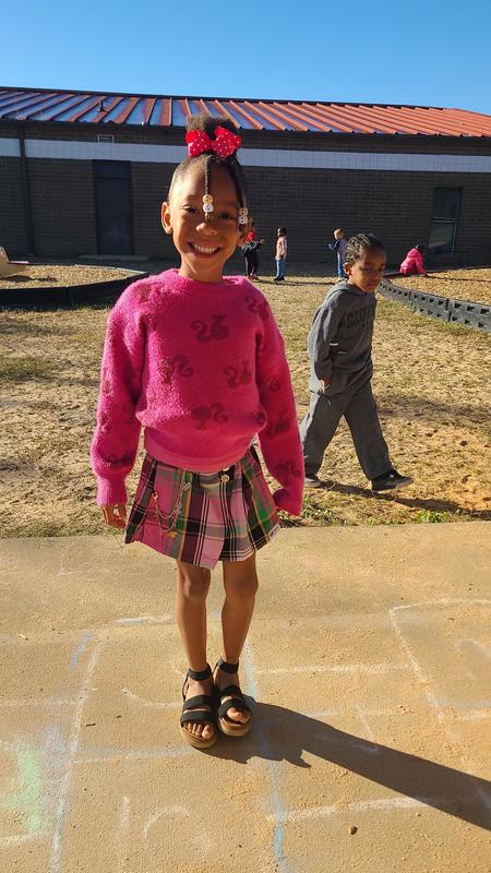 One student wearing pink.