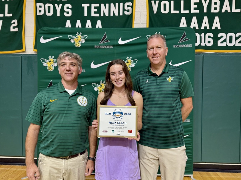 Aiken High School's Resa Slack honored as WJBF Scholar Athlete with coaches.