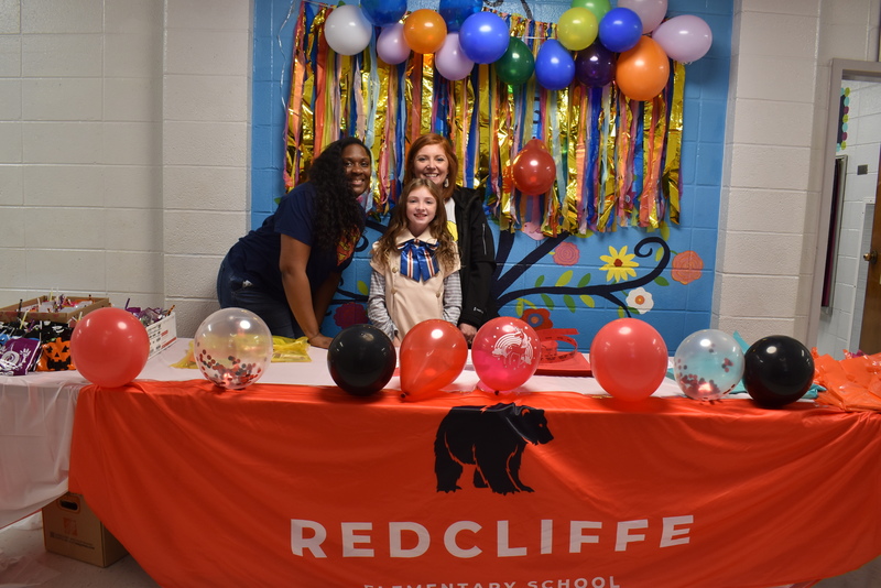 Welcome table with staff.