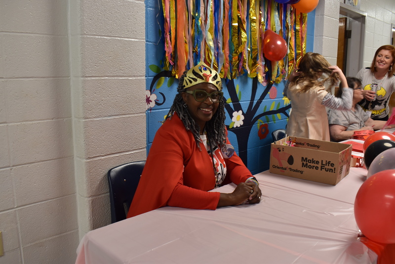 Staff at welcome table.