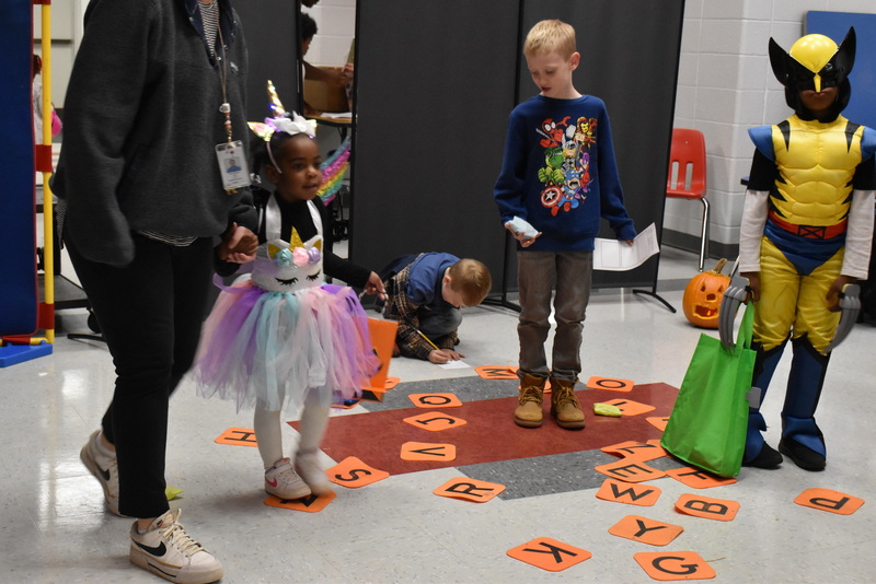 Students playing carnival games.