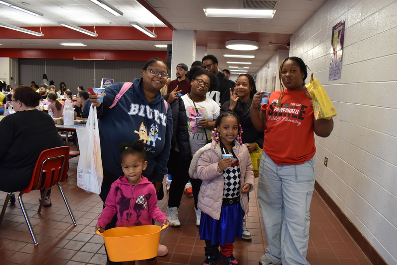 Families in food line.
