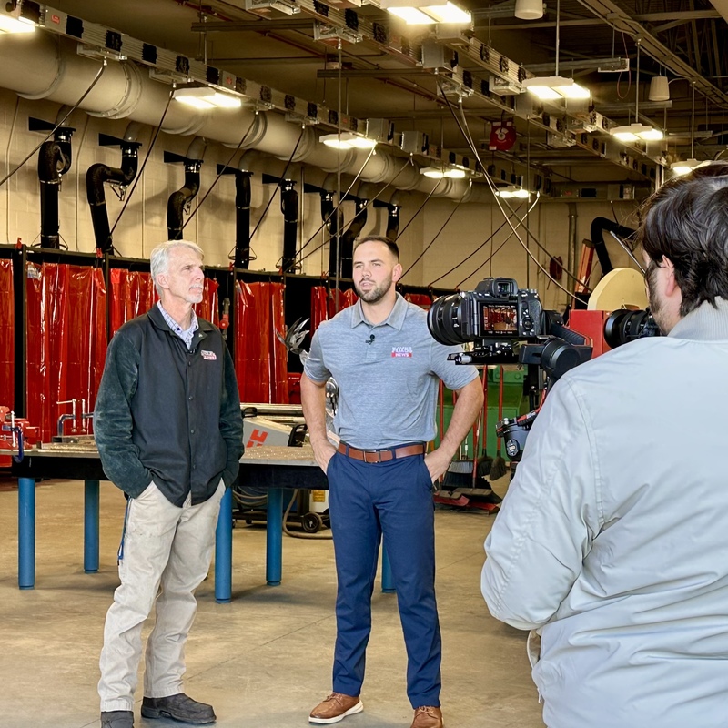 WSHS welding teacher being interviewed by FOX54 news anchor Jackson Roland.