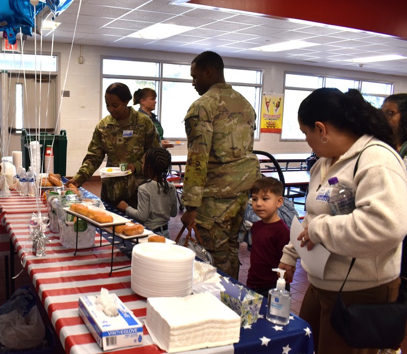 Families getting breakfast.