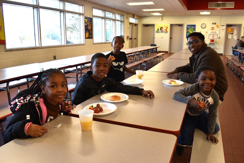 Family at breakfast.