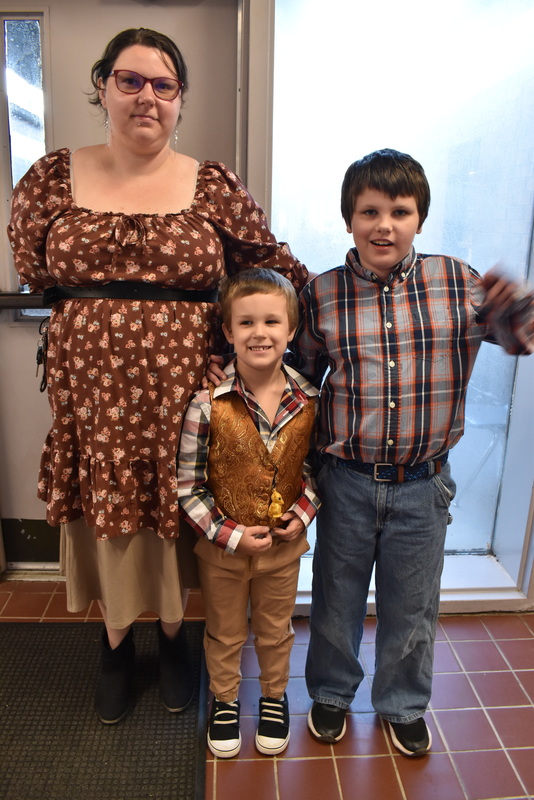 Families at rodeo dance.