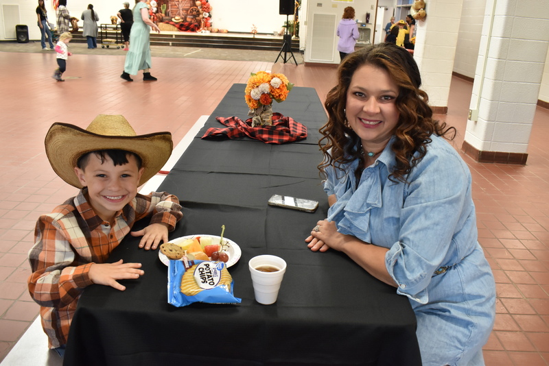 Families at rodeo dance.