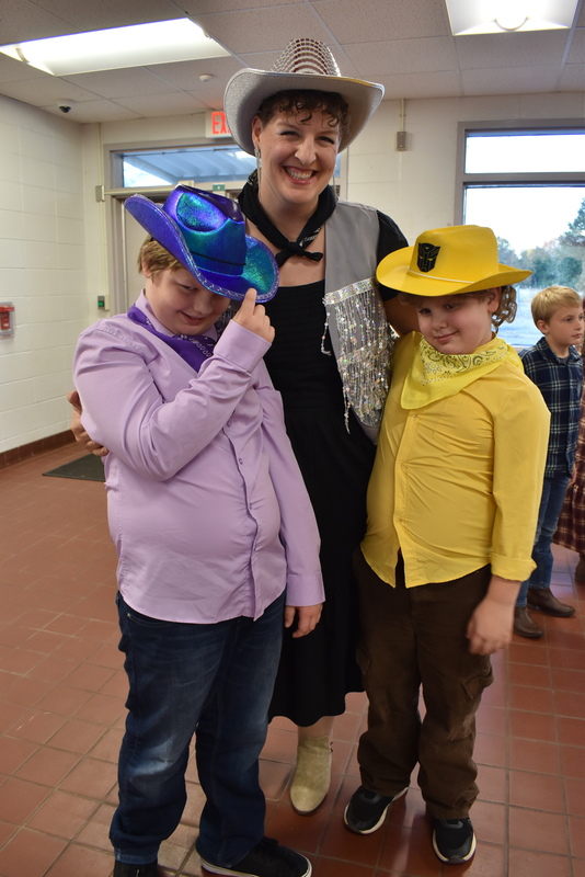 Families at rodeo dance.