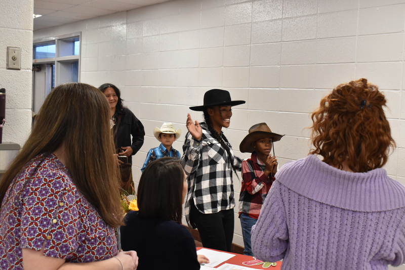 Families at rodeo dance.