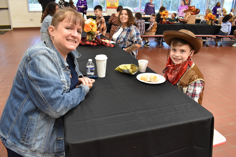 Families at rodeo dance.