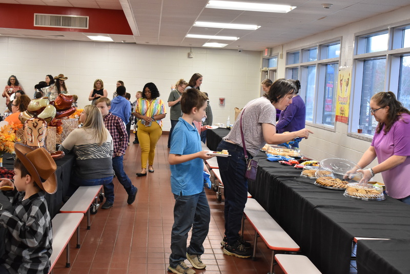 Families at rodeo dance.