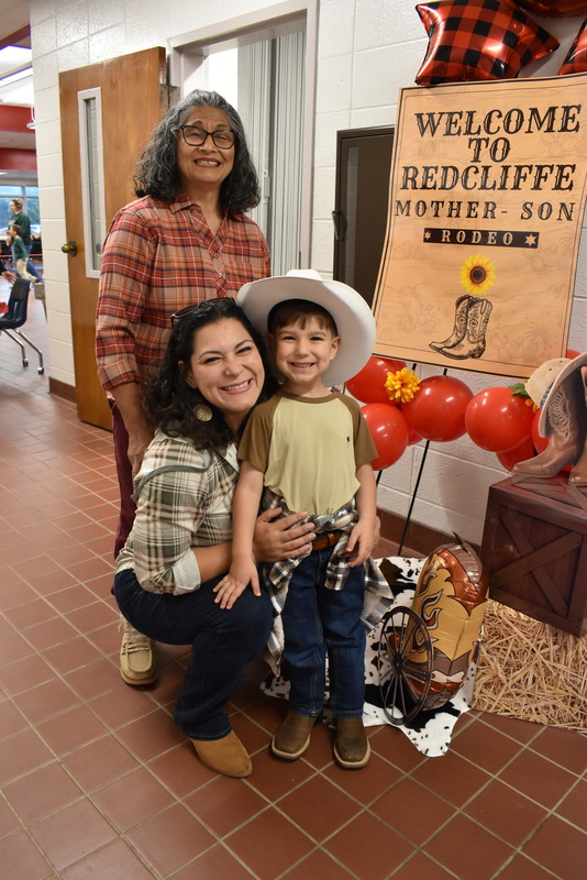Families at rodeo dance.