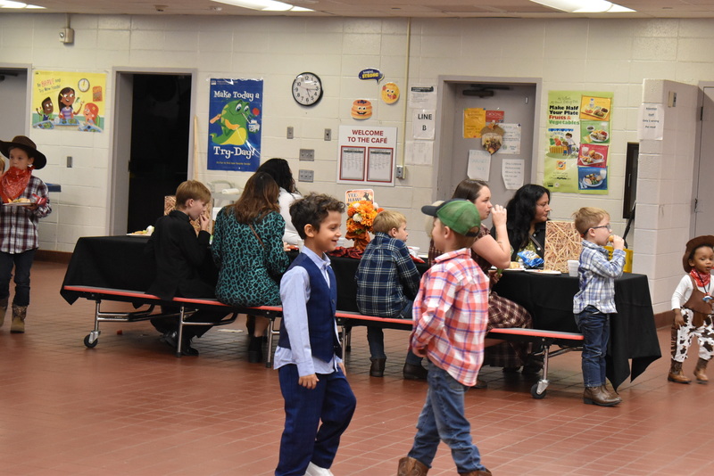 Families at rodeo dance.