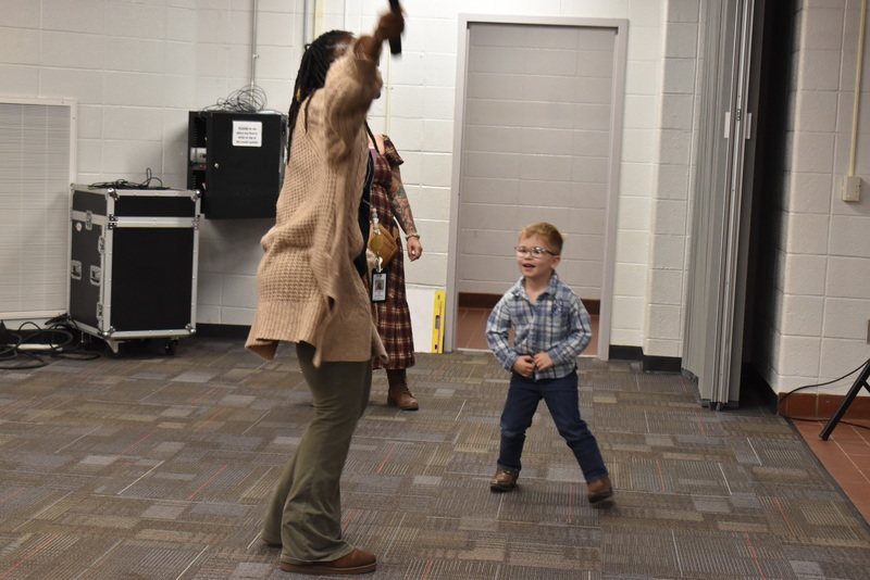 Families at rodeo dance.