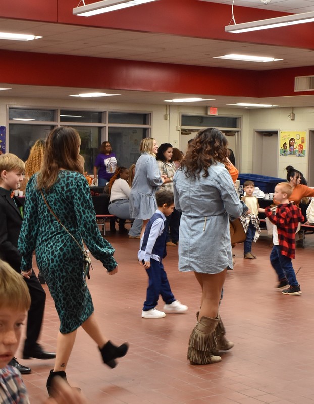 Families at rodeo dance.
