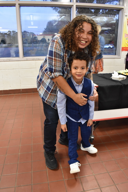 Families at rodeo dance.