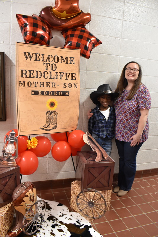 Families at rodeo dance.