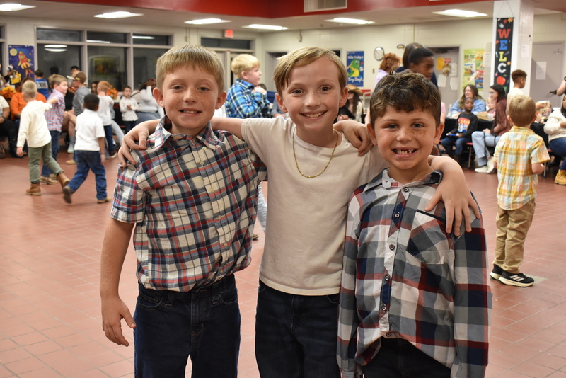 Families at rodeo dance.