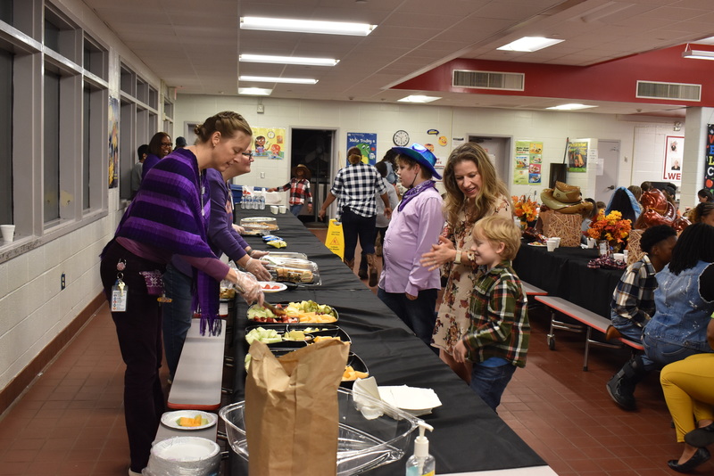 Families at rodeo dance.