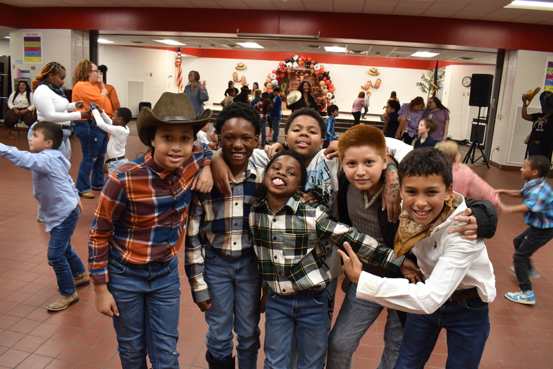 Families at rodeo dance.