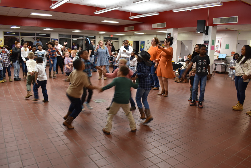 Families at rodeo dance.