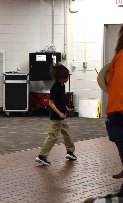 Families at rodeo dance.