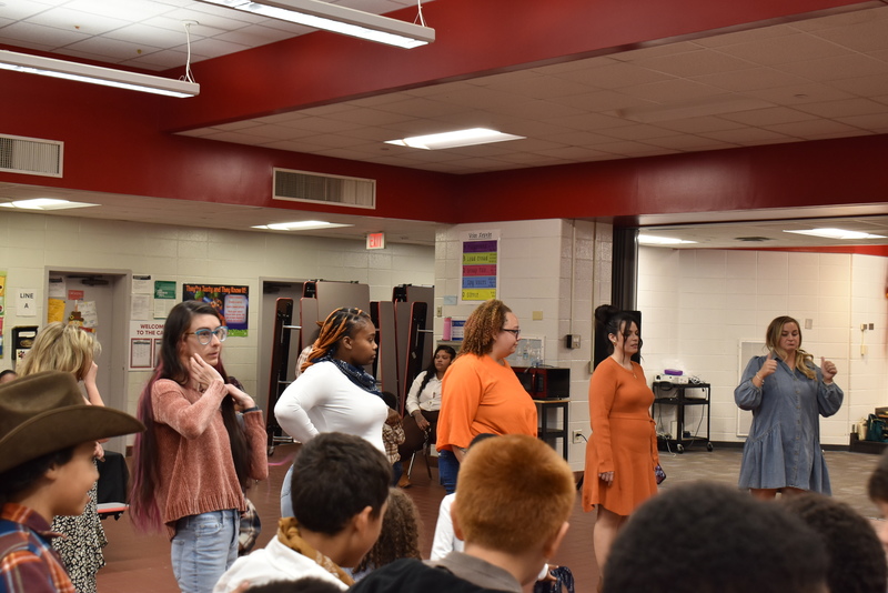 Families at rodeo dance.