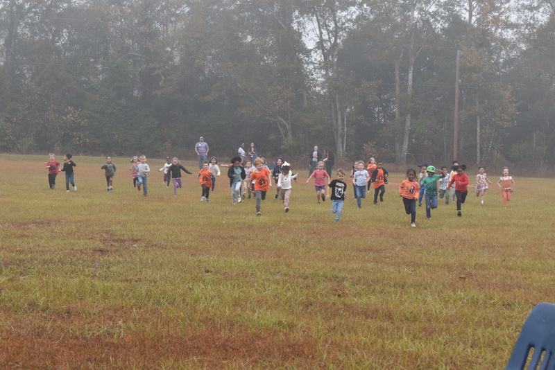 Students running and walking at the Turkey Trot.