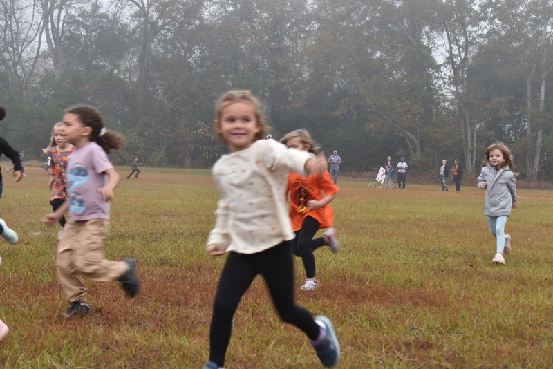 Students running and walking at the Turkey Trot.