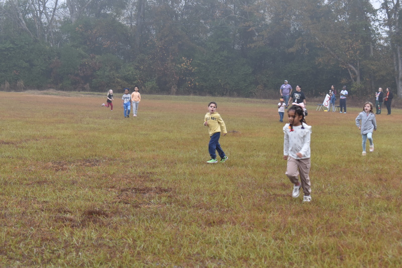 Students running and walking at the Turkey Trot.