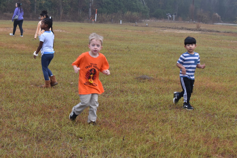 Students running and walking at the Turkey Trot.