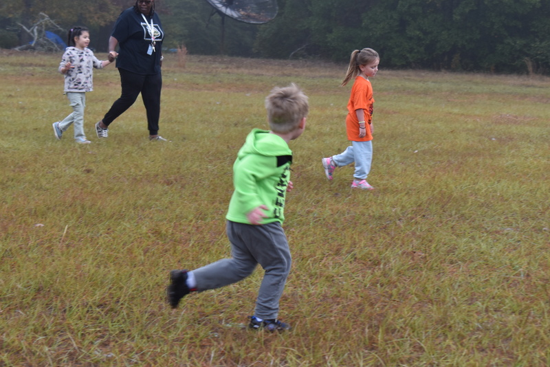 Students running and walking at the Turkey Trot.