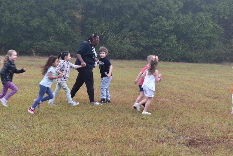 Students running and walking at the Turkey Trot.