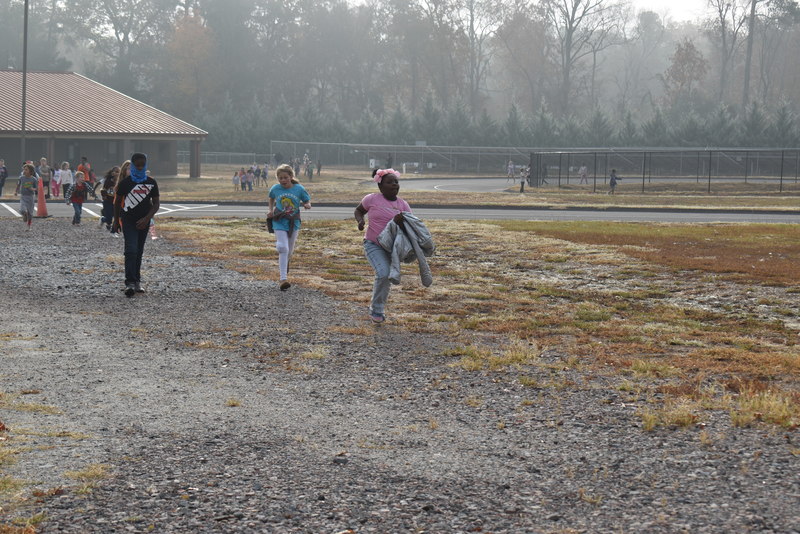 Students running and walking at the Turkey Trot.