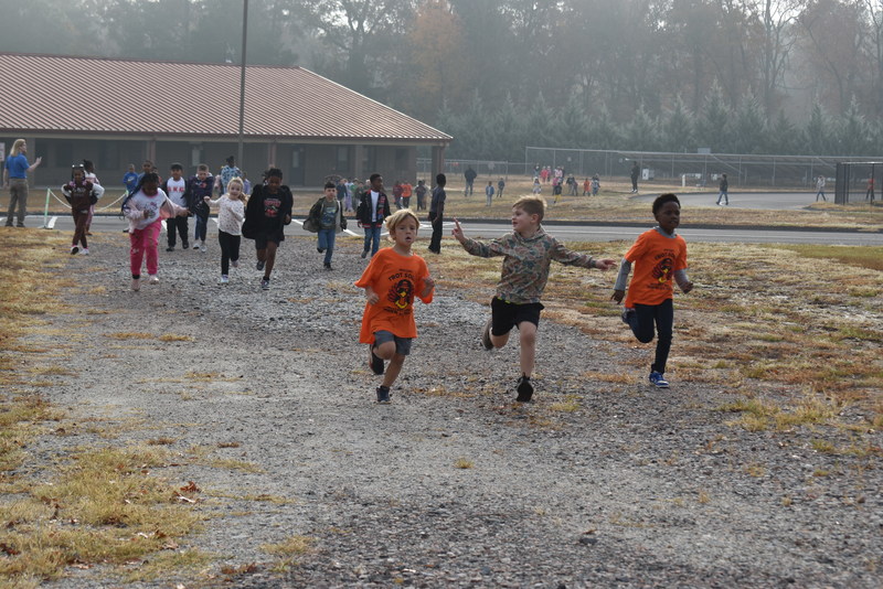Students running and walking at the Turkey Trot.