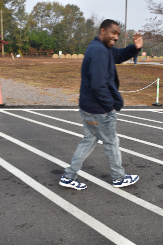 Parent walking at the Turkey Trot.