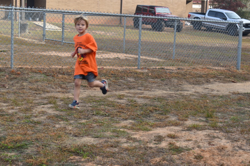 Students running and walking at the Turkey Trot.