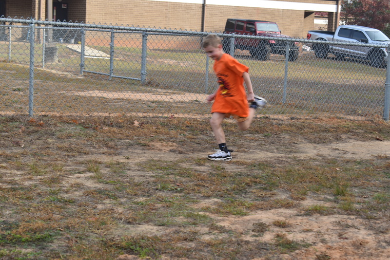 Students running and walking at the Turkey Trot.