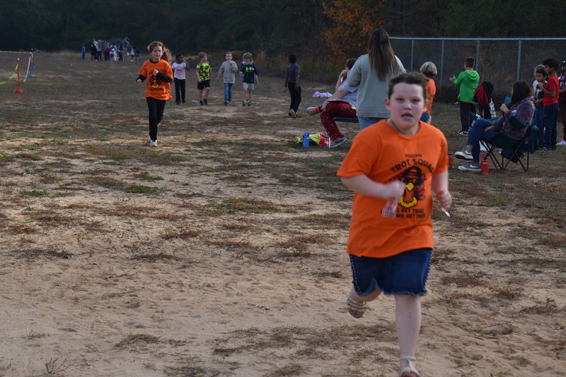 Students running and walking at the Turkey Trot.