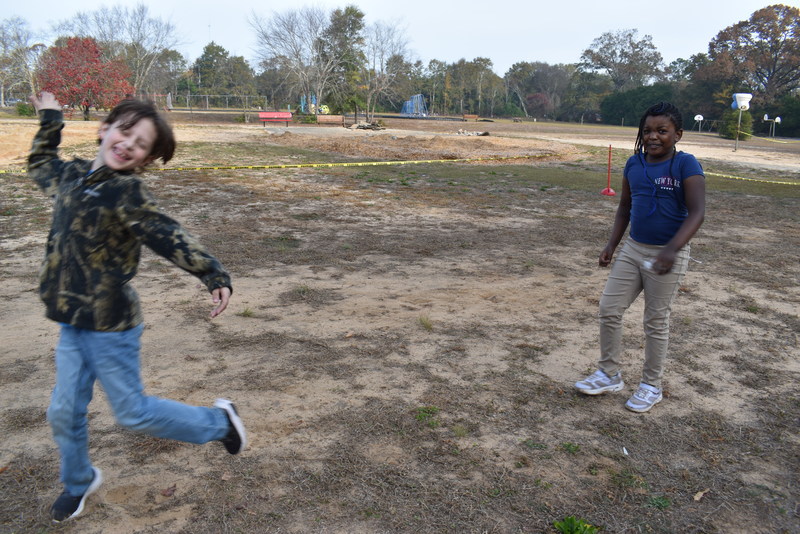Students running and walking at the Turkey Trot.