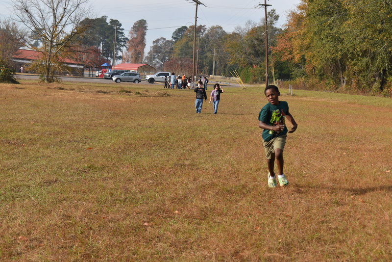 Students running and walking at the Turkey Trot.