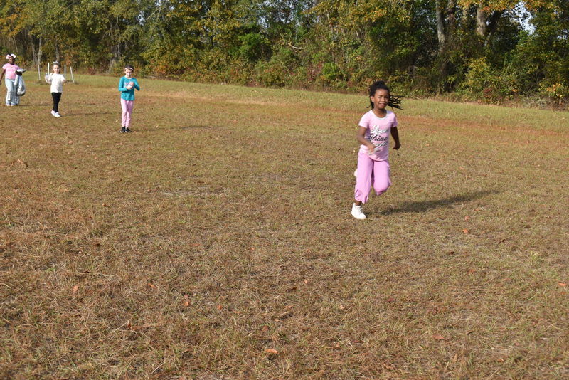 Students running and walking at the Turkey Trot.