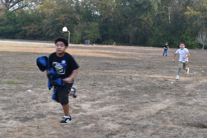 Students running and walking at the Turkey Trot.